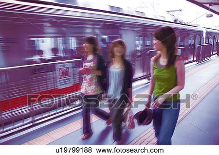 Stock Photo - Three Young Adult Women. Fotosearch