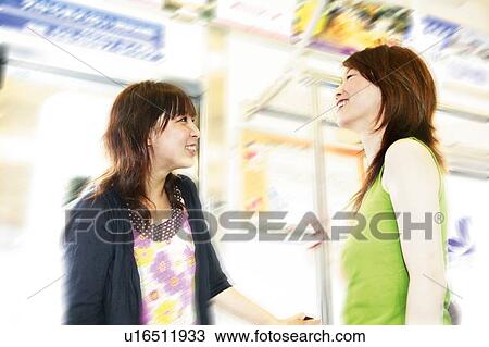 Two Young Adult Women on the Train View Large Photo Image Stock Image - Two Young Adult Women on the Train. Fotosearch