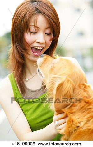 Stock Photography - Young Adult Woman and a Dog. Fotosearch