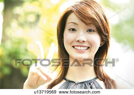 Stock Photo - Young Adult Woman Portrait. Fotosearch