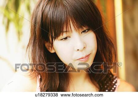 Stock Photo - Young Adult Woman Portrait. Fotosearch