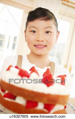 Stock Photography - Child and shortcake. Fotosearch