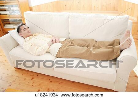 Picture - Sleeping father. Fotosearch