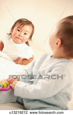 A Baby Boy and A Baby Girl View Large Photo Image Stock Image - A Baby Boy and A Baby Girl. Fotosearch