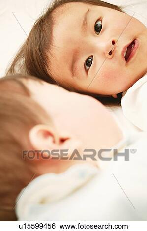 A Baby Girl and A Baby Boy View Large Photo Image Stock Photograph - A Baby Girl and A Baby Boy. Fotosearch
