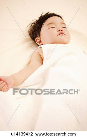 A Baby Girl sleeping peacefully View Large Photo Image Stock Image - A Baby Girl sleeping peacefully. Fotosearch
