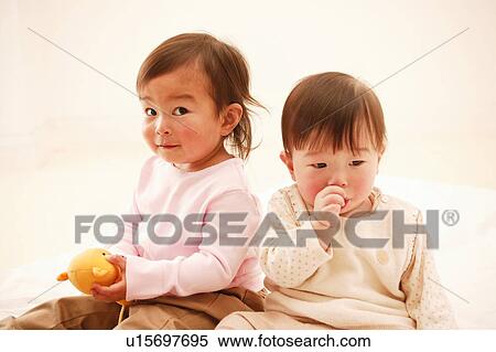 Stock Photography - Baby Girls. Fotosearch