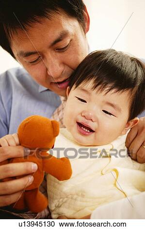 Stock Image - Father and his Baby. Fotosearch