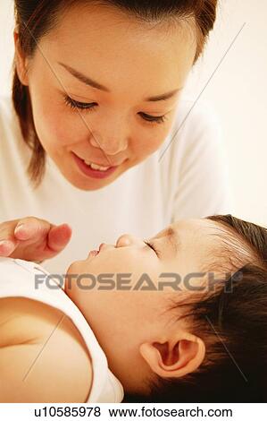 Stock Photo - Mother and her Baby. Fotosearch