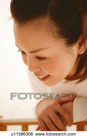 Stock Photo - Young Mother . Fotosearch