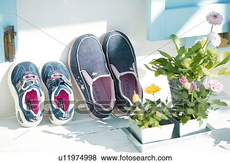 Stock Photo - Two pair of shoes. Fotosearch