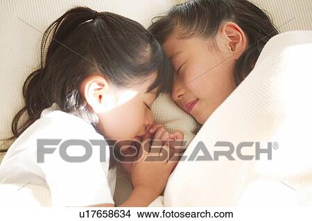 Picture - Young Girls sleeping. Fotosearch