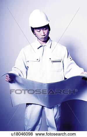 Construction Worker Looking Blueprint View Large Photo Image Stock Photo - Construction Worker Looking Blueprint. Fotosearch