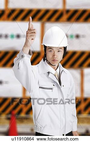 Construction Worker Pointing Up View Large Photo Image Picture - Construction Worker Pointing Up. Fotosearch