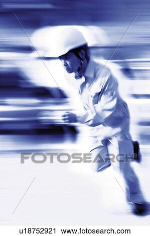 Stock Image - Construction Worker Running. Fotosearch