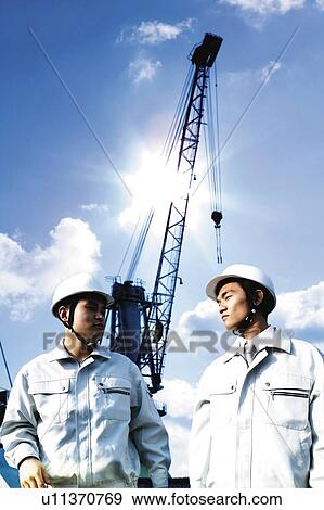 Stock Photo - Construction Workers. Fotosearch