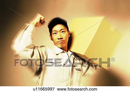 Delivery Man Posing View Large Photo Image Stock Photo - Delivery Man Posing. Fotosearch