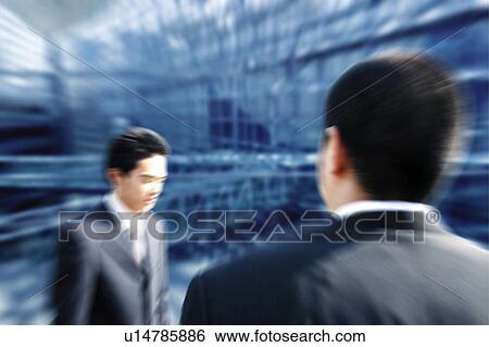 Stock Photograph - Young Businessmen. Fotosearch