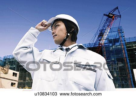 Young Construction Worker Putting Hand On Head View Large Photo Image Stock Image - Young Construction Worker Putting Hand On Head. Fotosearch