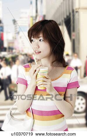 Young Woman Drinking View Large Photo Image Stock Photo - Young Woman Drinking. Fotosearch