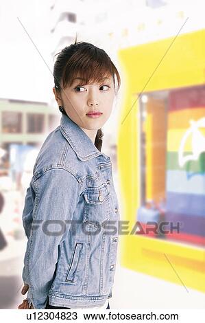 Young Woman Looking Over Shoulder View Large Photo Image Stock Image - Young Woman Looking Over Shoulder . Fotosearch