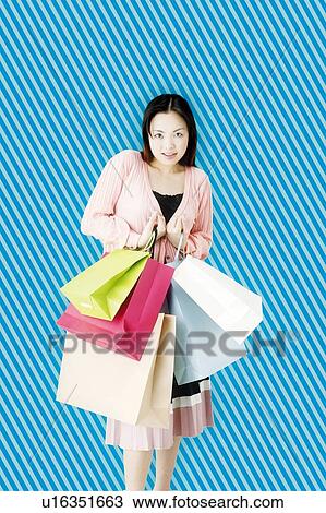 Young Woman Shopping View Large Photo Image Stock Image - Young Woman Shopping. Fotosearch
