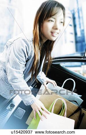 Young Woman Shopping View Large Photo Image Stock Photo - Young Woman Shopping. Fotosearch