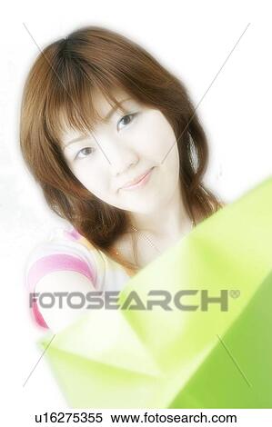 Stock Photography - Young Woman Shopping. Fotosearch