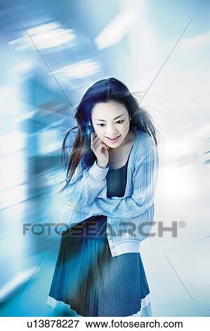 Stock Photo - Young Woman Thinking. Fotosearch
