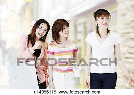 Stock Photography - Young Women Shopping. Fotosearch