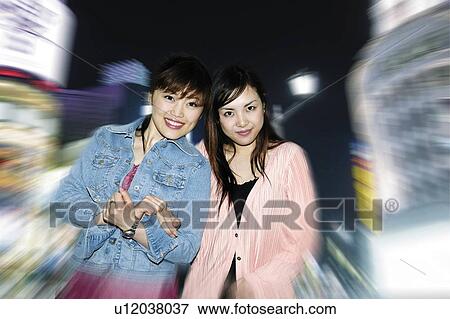 Stock Photo - Young Women. Fotosearch