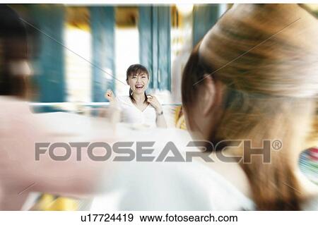 Stock Photo - Young Women. Fotosearch