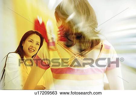 Young Women Talking View Large Photo Image Stock Image - Young Women Talking. Fotosearch