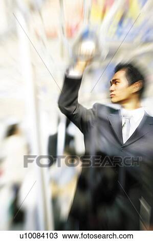 A Business man on the Train View Large Photo Image Stock Image - A Business man on the Train. Fotosearch