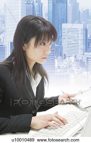 Stock Photo - A Business Woman. Fotosearch