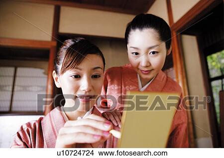 Woman composing a poem, haiku, tanka View Large Photo Image Picture - Woman composing a poem, haiku, tanka. Fotosearch