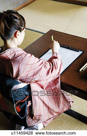 Stock Photo - Woman practicing a shodo. Fotosearch