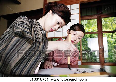 Woman teaching a shodo  View Large Photo Image Stock Image - Woman teaching a shodo . Fotosearch