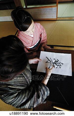 Woman teaching a shodo View Large Photo Image Stock Image - Woman teaching a shodo . Fotosearch