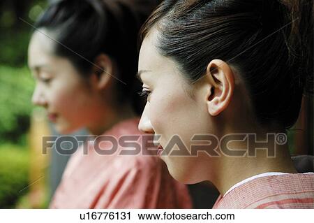 Women putting on a kimono, close up View Large Photo Image Stock Image - Women putting on a kimono, close up. Fotosearch