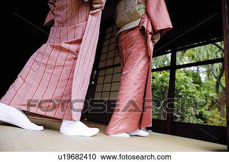 Women putting on a kimono, close up View Large Photo Image Stock Image - Women putting on a kimono, close up. Fotosearch