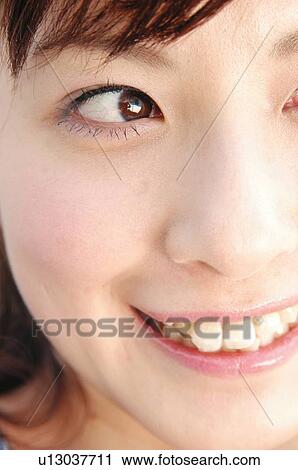 Stock Image - Smiling woman, Close-up. Fotosearch