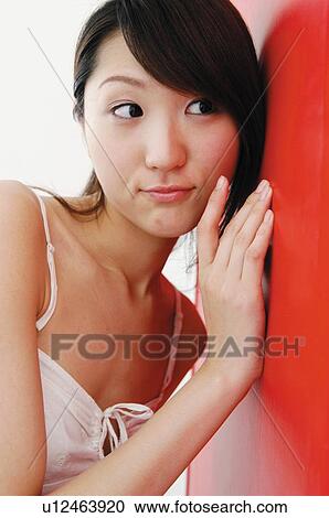 Woman pricking up her ears  View Large Photo Image Stock Image - Woman pricking up her ears . Fotosearch
