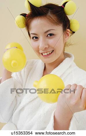 Picture - Woman taking exercise, Close-up?. Fotosearch