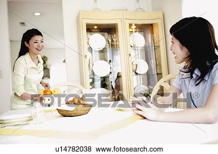 Young Woman Carrying Dish With Fruits View Large Photo Image Stock Photo - Young Woman Carrying Dish With Fruits. Fotosearch