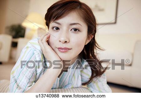 Young Woman Looking at Camera View Large Photo Image Stock Photo - Young Woman Looking at Camera. Fotosearch