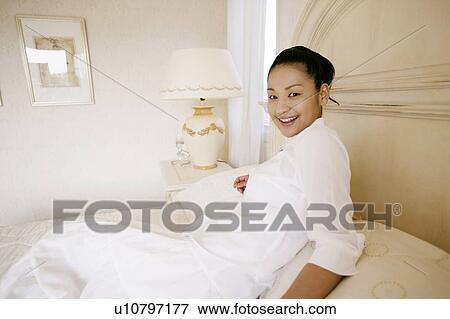 Young Woman Lying Down On Bed View Large Photo Image Stock Photo - Young Woman Lying Down On Bed. Fotosearch