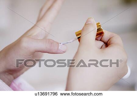 Young Woman Painting On Fingernail View Large Photo Image Stock Photograph - Young Woman Painting On Fingernail. Fotosearch