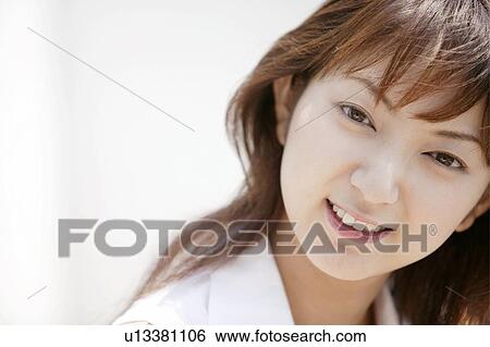 Young Woman Smiling View Large Photo Image Stock Photograph - Young Woman Smiling. Fotosearch