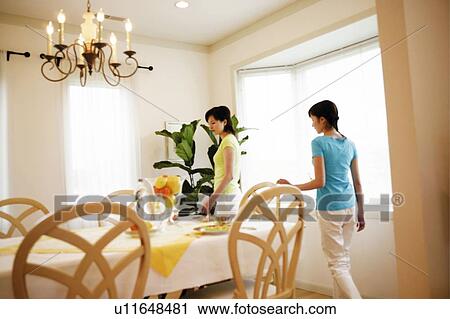 Young Women In Dining Room View Large Photo Image Stock Image - Young Women In Dining Room. Fotosearch